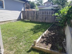 Side yard with wooden planter - 