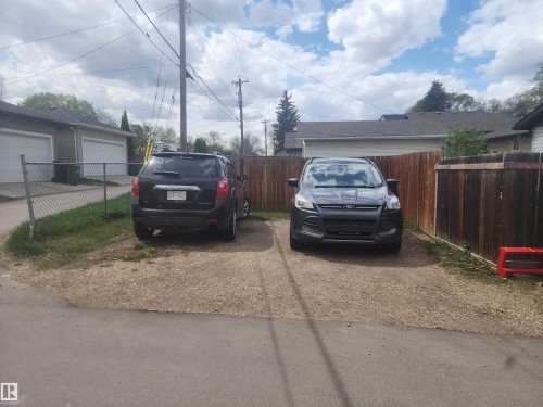 Gravel parking area at back for 2 vehicles - 3809 112 Avenue, Edmonton, AB - Outdoor