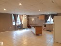 Open-concept living space featuring tiled flooring throughout. - 3809 112 Avenue, Edmonton, AB  - Indoor 