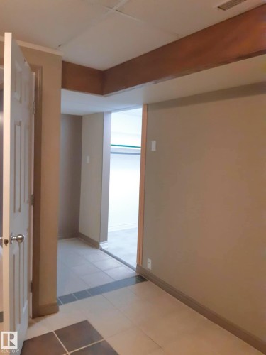 Entry to walk in closet in master bedroom - 3809 112 Avenue, Edmonton, AB - Indoor Photo Showing Other Room
