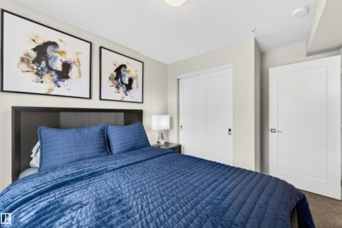 Recessed lighting illuminates neutral-toned walls - 209 1029 173 Stnw, Edmonton, AB - Indoor Photo Showing Bedroom