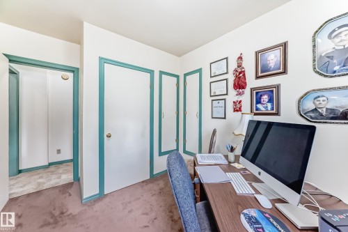 Neutral wall paint complemented by teal trim - 11309 115 Street, Edmonton, AB - Indoor Photo Showing Office