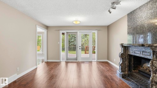 303 Westridge Road, Edmonton, AB - Indoor Photo Showing Living Room With Fireplace
