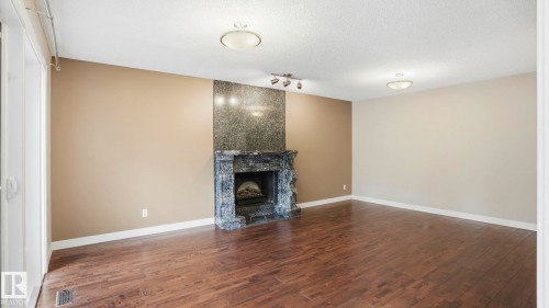 303 Westridge Road, Edmonton, AB - Indoor Photo Showing Living Room With Fireplace