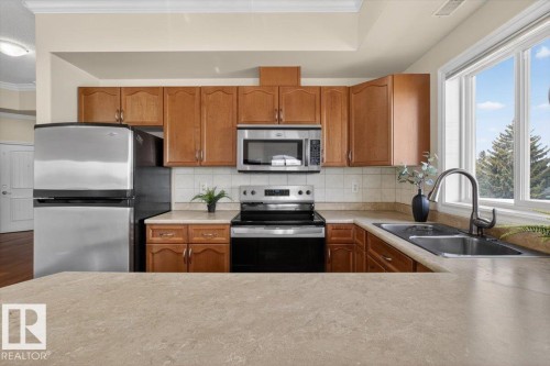 326 8528 82 Avenue, Edmonton, AB - Indoor Photo Showing Kitchen With Stainless Steel Kitchen With Double Sink