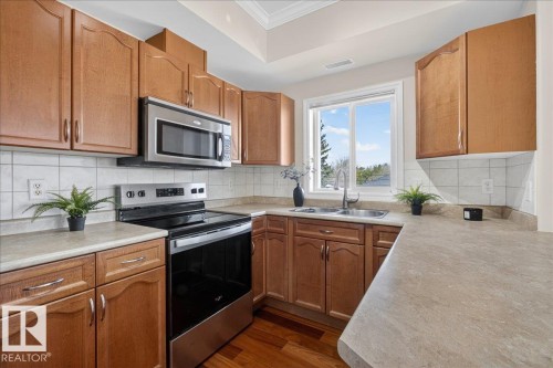 326 8528 82 Avenue, Edmonton, AB - Indoor Photo Showing Kitchen With Double Sink