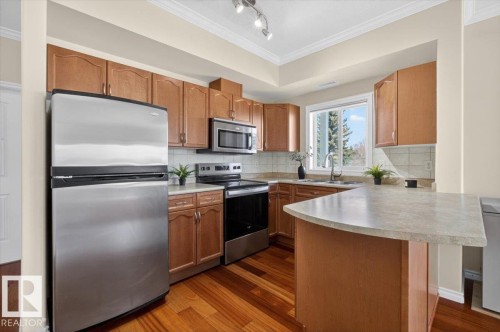 326 8528 82 Avenue, Edmonton, AB - Indoor Photo Showing Kitchen With Stainless Steel Kitchen With Double Sink