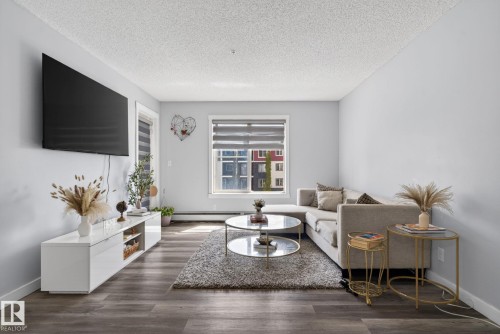318 5810 Mullen Place, Edmonton, AB - Indoor Photo Showing Living Room