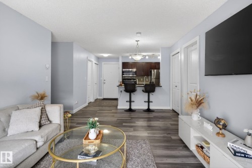 318 5810 Mullen Place, Edmonton, AB - Indoor Photo Showing Living Room