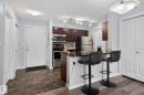 318 5810 Mullen Place, Edmonton, AB  - Indoor Photo Showing Kitchen With Stainless Steel Kitchen 