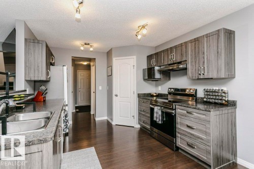 9 Cypress Link, Fort Saskatchewan, AB - Indoor Photo Showing Kitchen With Double Sink