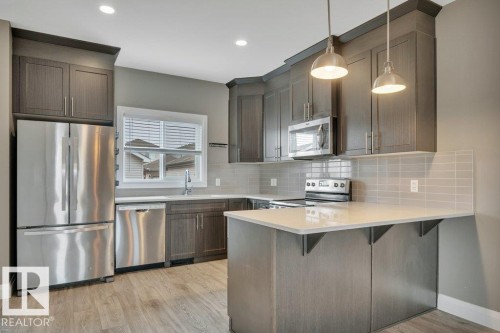 2036 South Creek Drive, Stony Plain, AB - Indoor Photo Showing Kitchen With Stainless Steel Kitchen With Upgraded Kitchen
