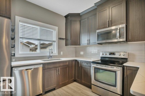 2036 South Creek Drive, Stony Plain, AB - Indoor Photo Showing Kitchen With Stainless Steel Kitchen With Upgraded Kitchen