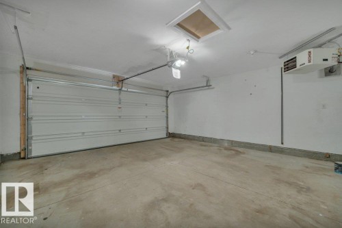 2036 South Creek Drive, Stony Plain, AB - Indoor Photo Showing Garage