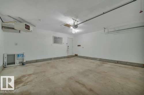 2036 South Creek Drive, Stony Plain, AB - Indoor Photo Showing Garage