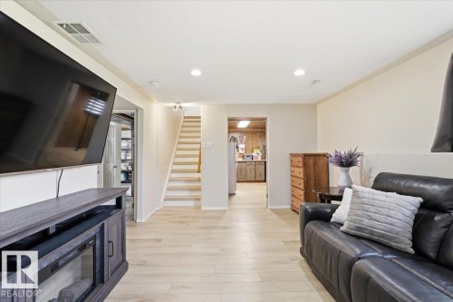 5409 55 Avenue, Wetaskiwin, AB - Indoor Photo Showing Living Room With Fireplace