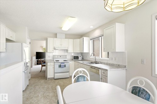 8604 157 Avenue, Edmonton, AB - Indoor Photo Showing Kitchen With Double Sink