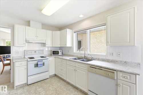8604 157 Avenue, Edmonton, AB - Indoor Photo Showing Kitchen With Double Sink