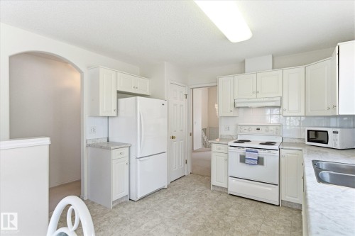 8604 157 Avenue, Edmonton, AB - Indoor Photo Showing Kitchen With Double Sink