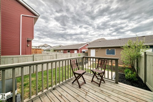 Expansive wood deck with a full railing system - 2125 24 Street, Edmonton, AB - Outdoor With Deck Patio Veranda With Exterior