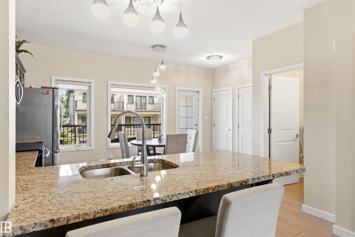 5835 Mullen Place, Edmonton, AB - Indoor Photo Showing Kitchen With Double Sink