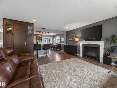 8410 95B Ave, Fort Saskatchewan, AB - Indoor Photo Showing Living Room With Fireplace