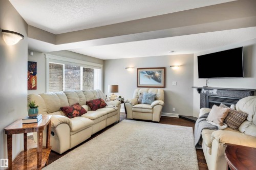 14704 88 Avenue, Edmonton, AB - Indoor Photo Showing Living Room With Fireplace