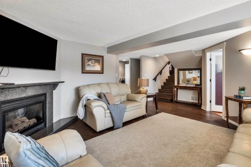 14704 88 Avenue, Edmonton, AB - Indoor Photo Showing Living Room With Fireplace