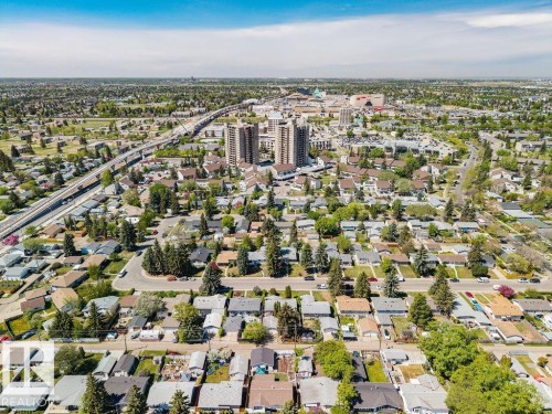 Aerial perspective of a residential area featuring single-story homes with varied rooflines - 8714 164 Street, Edmonton, AB 