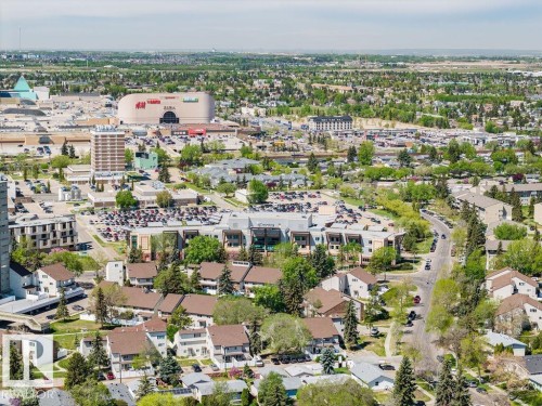 Expansive urban landscape featuring a variety of architectural styles, mature trees, and numerous commercial properties - 8714 164 Street, Edmonton, AB 