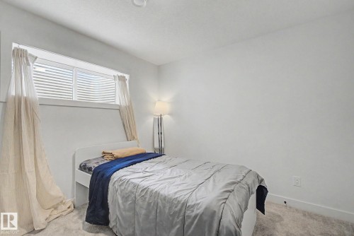 117 Brickyard Drive, Stony Plain, AB - Indoor Photo Showing Bedroom