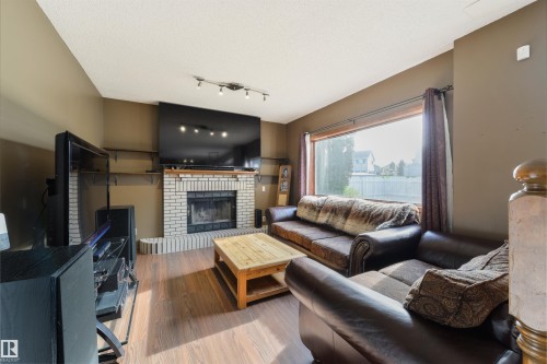 4012 44 Avenue, Stony Plain, AB - Indoor Photo Showing Living Room With Fireplace