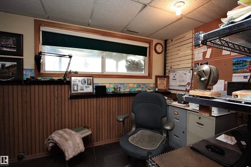 Need a home office?  The lower-level den makes a great craft room or home office. - 13315 136 Street, Edmonton, AB - Indoor Photo Showing Office