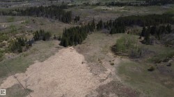 Offering a diverse landscaped opportunity to design your ultimate country estate. With rolling hills, open pasture, and mature woods, the land is a blank canvas ready for your vision." - 