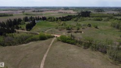 Front entry open space ideal location to set up Shop or Business with easy access to range road while keeping your new residence just over the ridge private, work and live on your own land. - 