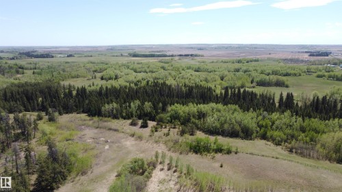 Owning your own property truly unlocks endless opportunities, giving you the freedom to build a custom homestead, start an agricultural or recreation business, or simply create a private sanctuary. - 563003 Range Road 205, Rural Lamont County, AB 