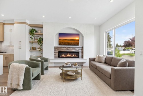 5310 103A Avenue, Edmonton, AB - Indoor Photo Showing Living Room With Fireplace