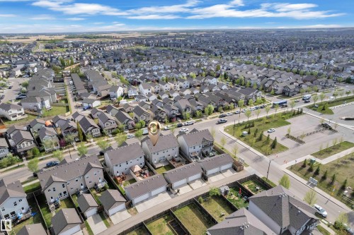 Aerial perspective showcasing a residential neighborhood with detached homes, featuring multiple streets and green spaces - 432 Watt Boulevard, Edmonton, AB - Outdoor With View