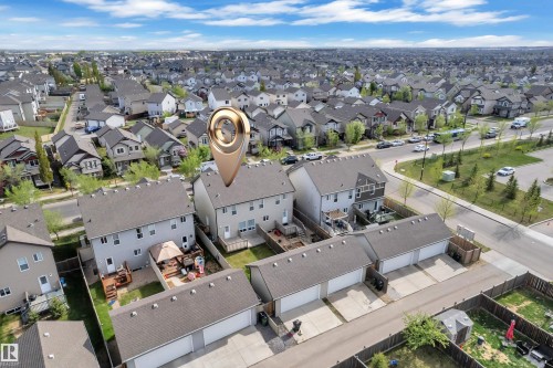 Residential property featuring a light-colored exterior, an upper-level deck, and a fenced backyard - 432 Watt Boulevard, Edmonton, AB - Outdoor With View