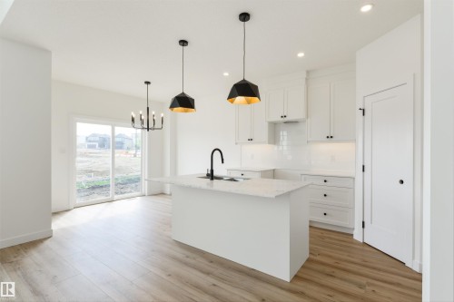 1305 Hawks Ridge Link Nw, Edmonton, AB - Indoor Photo Showing Kitchen With Upgraded Kitchen