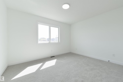 1305 Hawks Ridge Link Nw, Edmonton, AB - Indoor Photo Showing Other Room