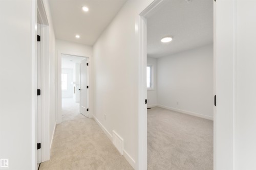 1305 Hawks Ridge Link Nw, Edmonton, AB - Indoor Photo Showing Other Room