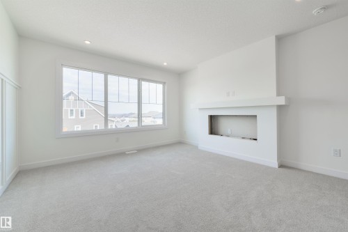 1305 Hawks Ridge Link Nw, Edmonton, AB - Indoor With Fireplace