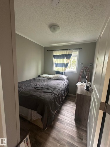 109 42208 Twp Rd 650, Rural Bonnyville M.D., AB - Indoor Photo Showing Bedroom