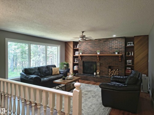 1, 49321 Range Road 72, Rural Brazeau County, AB - Indoor Photo Showing Living Room With Fireplace