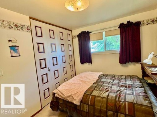 Bedroom - 5454 46 Street, Vegreville, AB - Indoor Photo Showing Bedroom