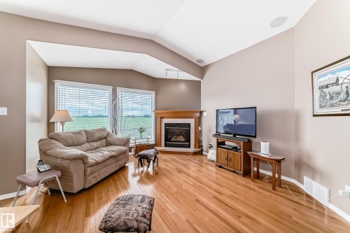 40 Heritage Crescent, Stony Plain, AB - Indoor Photo Showing Living Room With Fireplace
