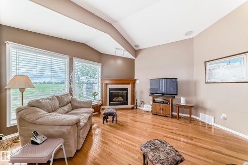40 Heritage Crescent, Stony Plain, AB - Indoor Photo Showing Living Room With Fireplace