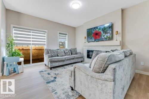 1459 Cherniak Way, Edmonton, AB - Indoor Photo Showing Living Room With Fireplace