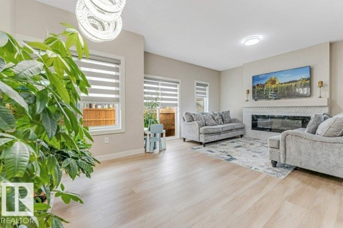 1459 Cherniak Way, Edmonton, AB - Indoor Photo Showing Living Room With Fireplace